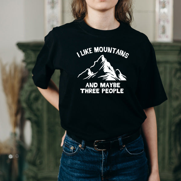 I Like Mountains And Maybe Three People graphic T-shirt mockup